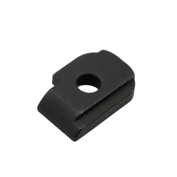 1911 Firing Pin Stop in black steel showing firing pin hole, slide channel grooves, and flat body from front angle