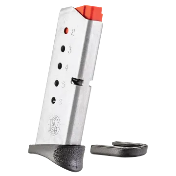 Bodyguard 380 magazine with black textured base pad installed and extra detachable base pad beside it