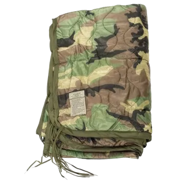 Woodland Camouflage Wet Weather Poncho Liner folded showing woodland camo quilted nylon exterior, military spec label, and OD green tie strings